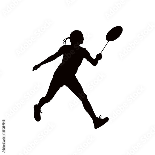 Silhouette of a female badminton player swinging racket in action
