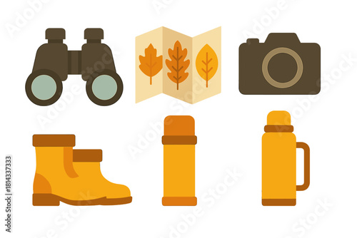 Essential outdoor gear set with binoculars, map, camera, boots, and thermos for autumn travel and hiking