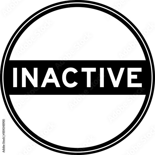 Black color round seal sticker in word inactive on white background