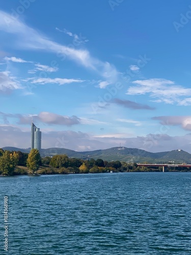Scenic view of river with surrounding landscape and trees