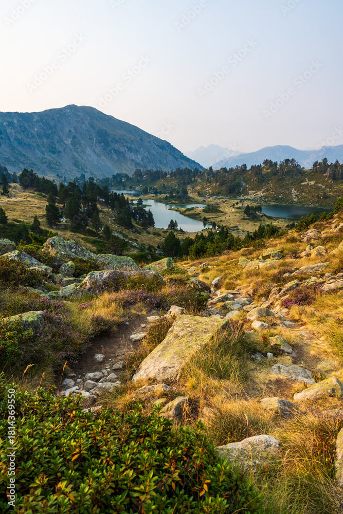Fototapeta premium Lac du Milieu at sunrise, a bivouac location near Pic du Bastan