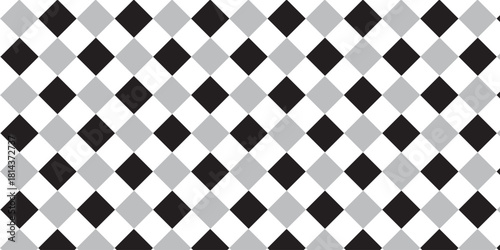 Harlequin seamless pattern. Geometric background with with black and white rhombus. Circus or masquerade ornament. Black, gray and white
