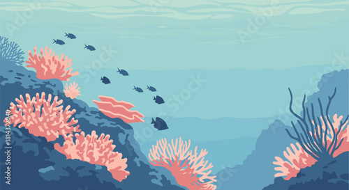 Underwater coral reef scene with schools of small fish swimming in clear blue water.