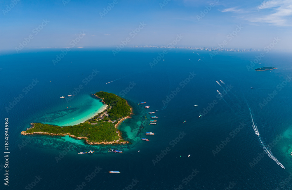 Fototapeta premium Beautiful island Koh Sak with white beach and turquoise sea, Pattaya Thailand, aerial view