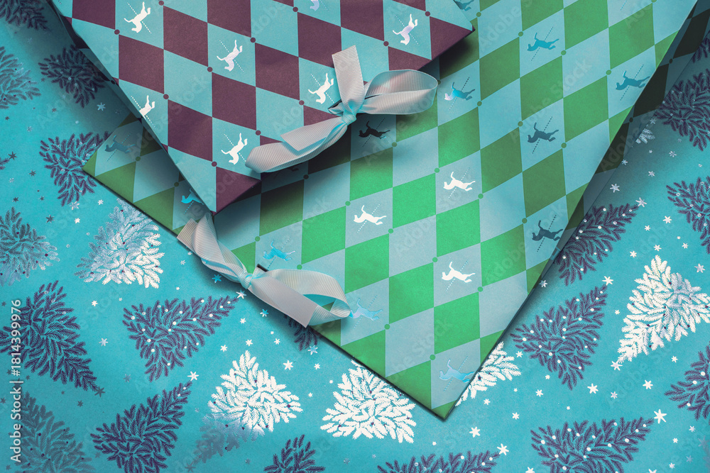 Obraz premium Beautiful holiday packages lying on Christmas backdrop