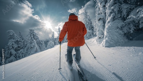 Skier Glides Down a Snowy Slope Under a Bright Sky in Winter Wonderland