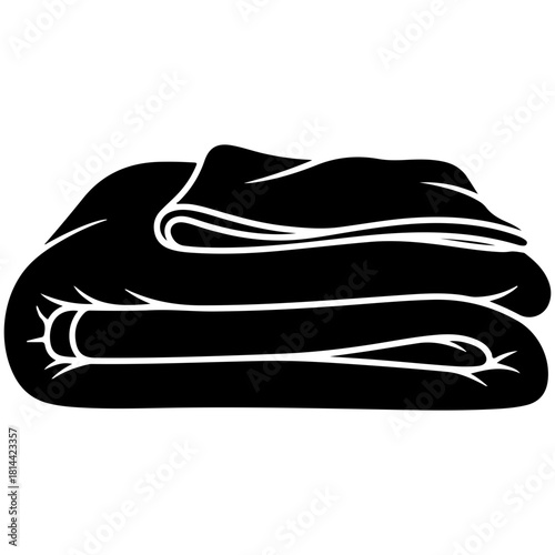 Black and white icon of a folded blanket or comforter for bedding
