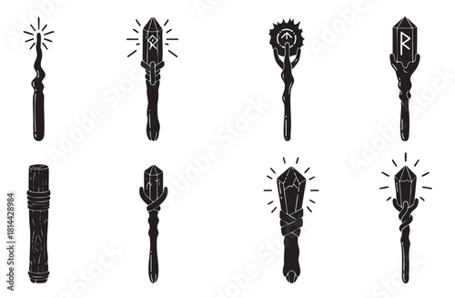 Collection of black silhouette icons featuring various magical wands, staffs, and scepters with glowing crystals and ancient runes