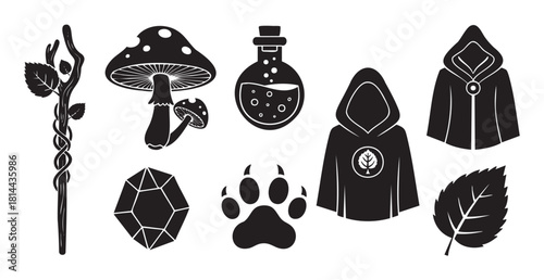Graphic set of black silhouette icons representing magic, fantasy, and nature, including a staff, mushroom, potion, crystal, paw print, and hooded cloak for RPG themes