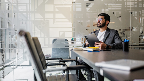 Business meeting in a modern office with thoughtful man