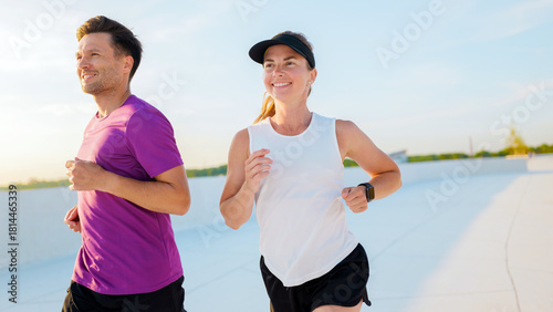 Morning joggers enjoying fitness together outdoors