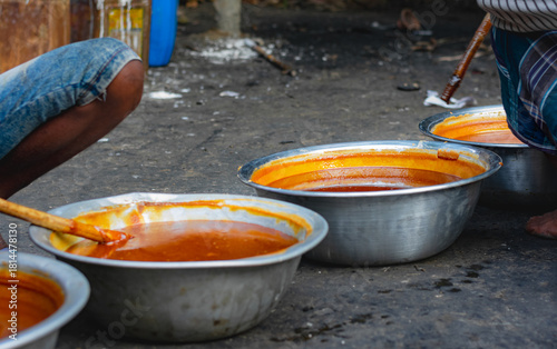 Handmade Delicacy: The Texture and Rich Color of Cooling Date Jaggery