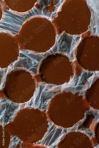 Date Palm Jaggery (Patali Gur) Cooling in Traditional Molds and Plastic Sheets