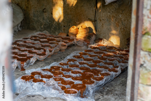 Rustic Industry: Early Morning Sun on the Jaggery Production Floor