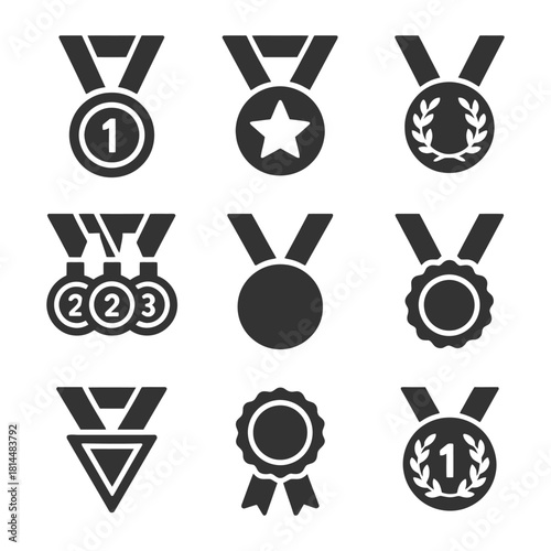 Set of nine black icon medals with various designs.