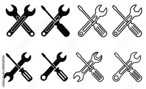 Wrench and screwdriver crossed repair tool icon set