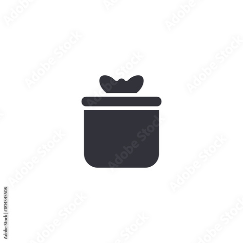 Solid glyph icon of a simple, tall gift box with a bow on top, representing presents, holiday events, surprise gifts, customer bonuses, and celebratory rewards in a modern design.