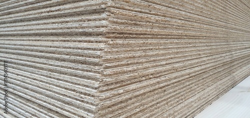Wooden chipboards in a hardware store. Construction materials for furniture and repairs. Wooden slabs Chipboard stack, interior design, handmade furniture. Wood products, lumber.	