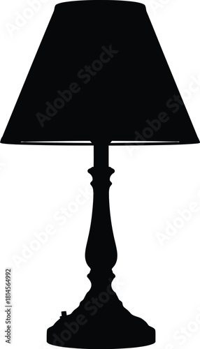 Silhouette of a classic table lamp with a dark conical shade and a turned base