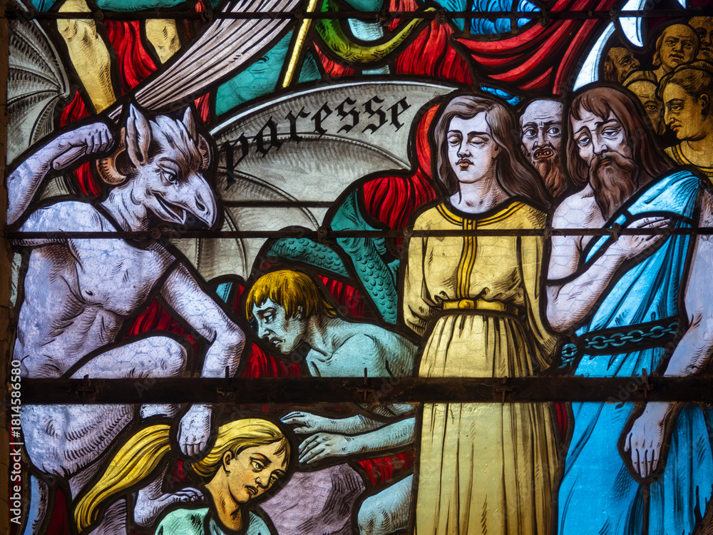 Obraz premium Stained glass (19th century) of Vision of hell and demons tormenting souls.