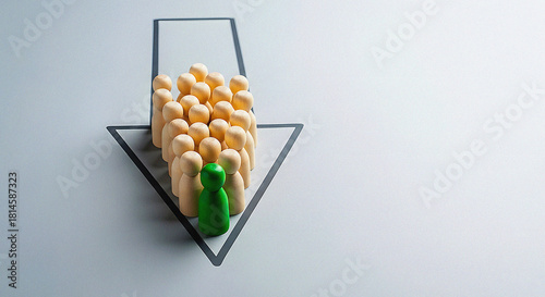 Green Leader Figure Guiding a Crowd of Wooden Peg Dolls Downwards, Symbolizing Trend, Decline, or Followership in a Business Concept