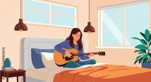 A relaxed young woman is sitting on her bed in a cozy sunlit bedroom playing an acoustic guitar and enjoying a peaceful moment.