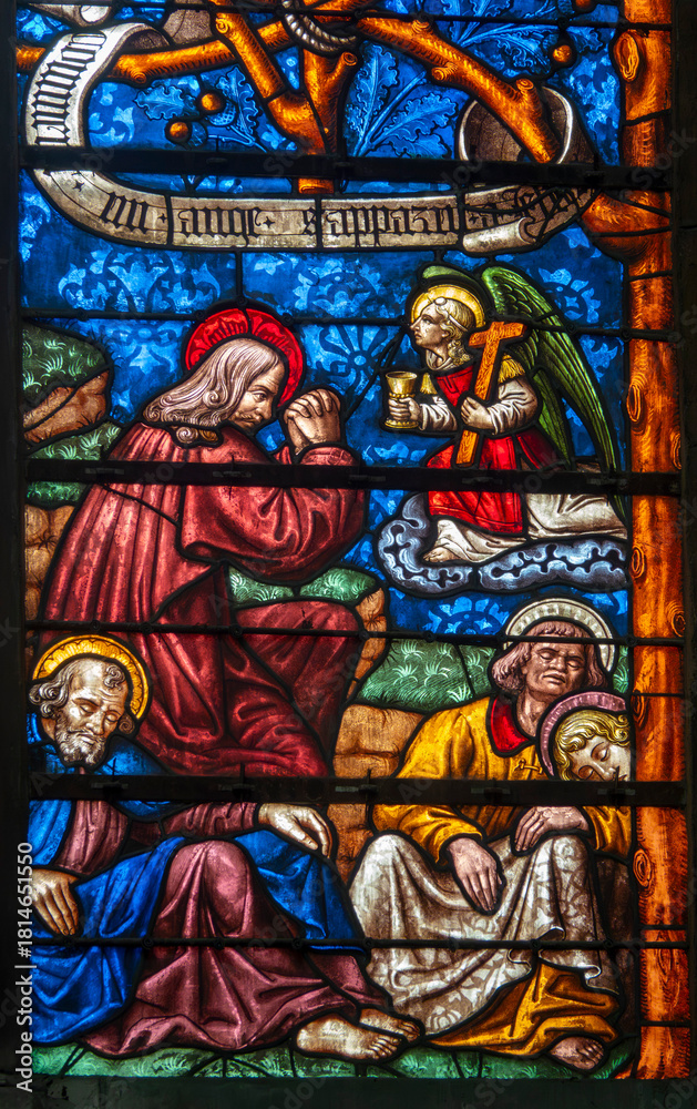 Fototapeta premium Stained glass (16th century) of The prayer of Jesus in the Garden of Gethsemane with the sleeping disciples.