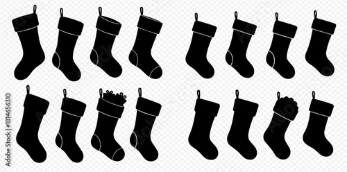 Silhouette image of Christmas stockings in a row, some decorated, on a transparent background.
