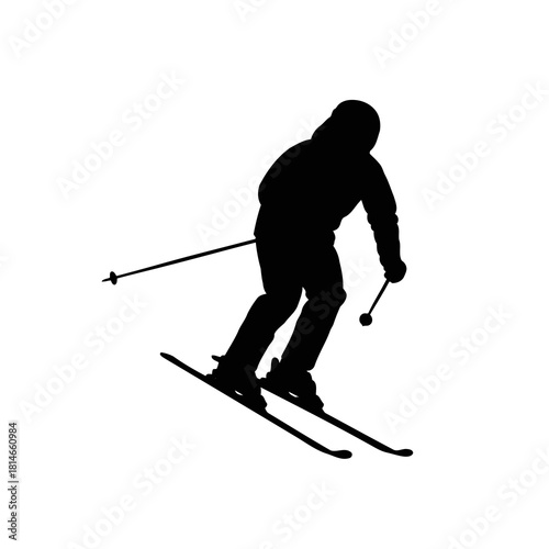 Silhouette of a skier in action with ski poles and skis on a