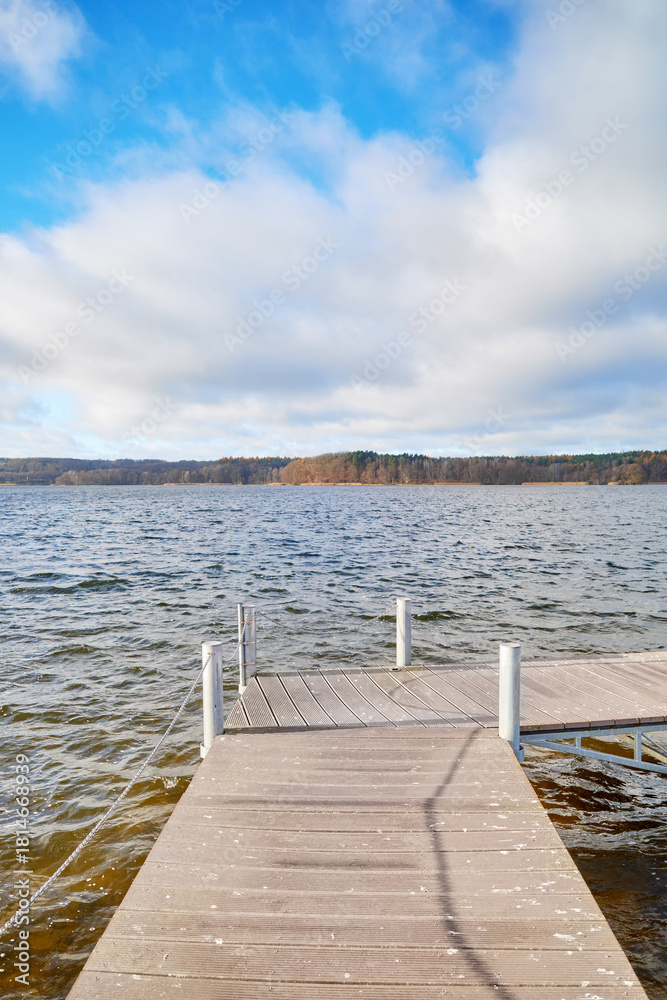 Fototapeta premium Pier on Lake Charzykowskie in autumn, Charzykowy, Poland.