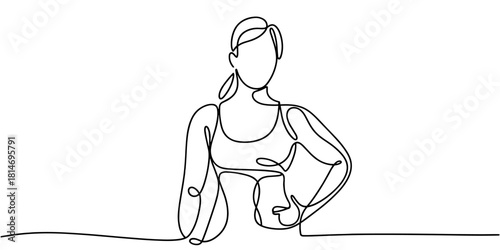 a fit woman posing with hands on hips, expressing strength, confidence, and active lifestyle themes.