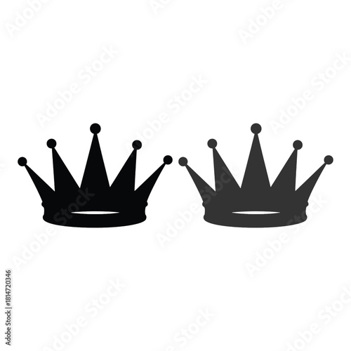Two black crowns depicted in a simple flat silhouette style illustration