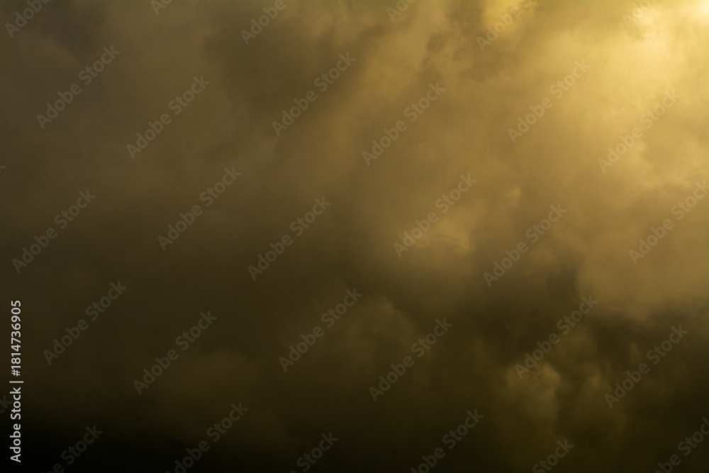 Obraz premium Golden sky, natural phenomena, storms and weather in the rainy season and changes in weather conditions