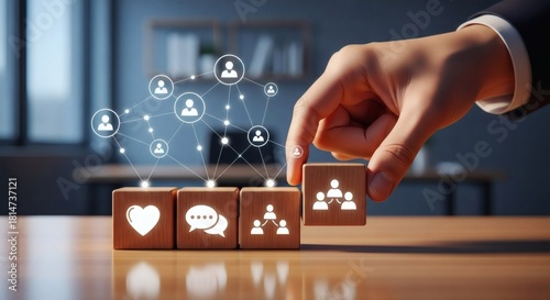 Human connection and team communication concept. Wooden blocks with emotional, chat, and team icons connected by digital social network lines in professional workspace
