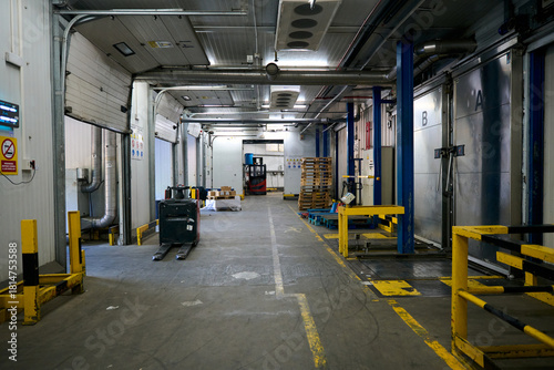 Cold chain warehouse logistics with pallet jack and forklift