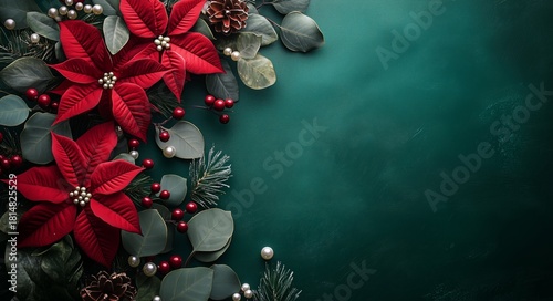 Festive Poinsettia Flowers and Holiday Decorations on a Green Background for ...