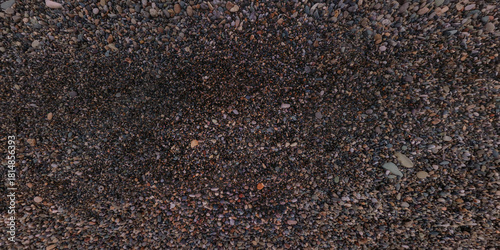 panorama view from above on surface of small pebbles and stones on sea coast