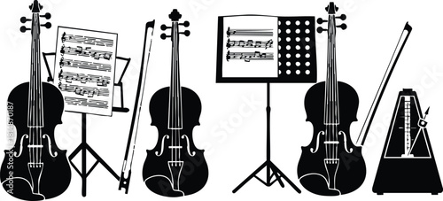 Musical instruments including violins, sheet music, and a metronome for creative projects and compositions 