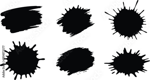 Black ink splatters and brush strokes for creative design projects and artistic expressions 