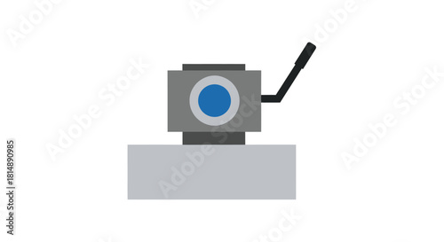 Gray block machine with a handle and blue circle detail