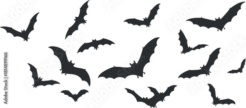 Silhouette vector illustration of flying bats in a dynamic arrangement, perfect for Halloween themes and spooky designs
