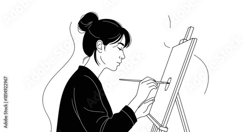 Artist painting on canvas with focused concentration creating art masterpiece.