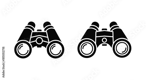A simple depiction of two black binocular icons on a white background