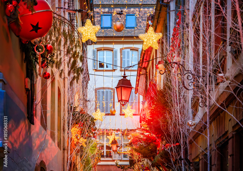 Lights illuminate half timbered houses, Christmas Market, Strasbourg, France,