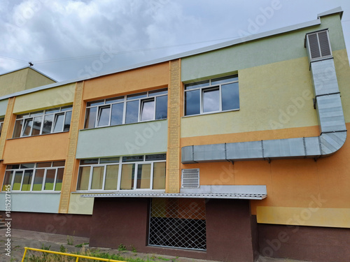 Hood. Ventilation pipe. Metal box for air circulation on school building