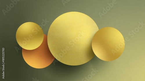 Abstract composition featuring three gold spheres of varying sizes against a soft green background emphasizing balance and harmony in design aesthetics