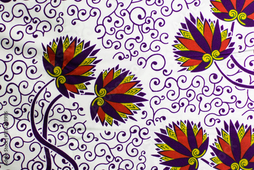 top view of white ankara fabric, flatlay of nigerian wax cloth with designs, spread out white ankara material