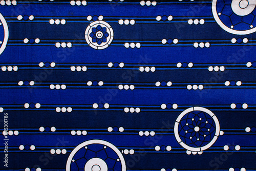 close up view of blue ankara fabric, different patterns on blue ankara material, flatlay of nigerian wax cloth