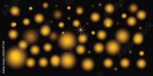 Golden bokeh lights and sparkles on a dark background for festive design