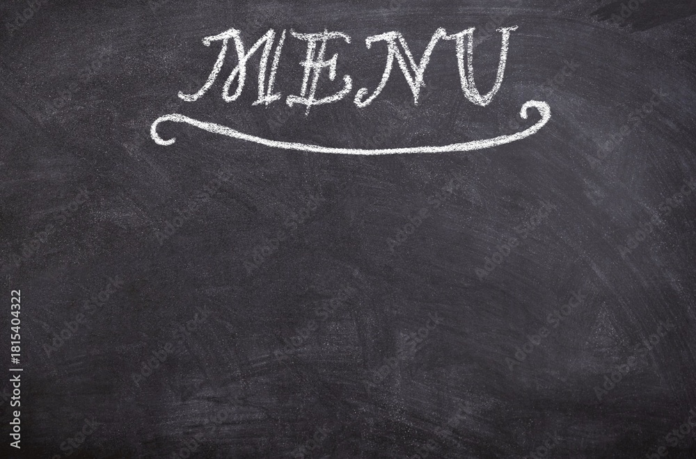 Obraz premium A chalkboard with the word Menu written in white chalk